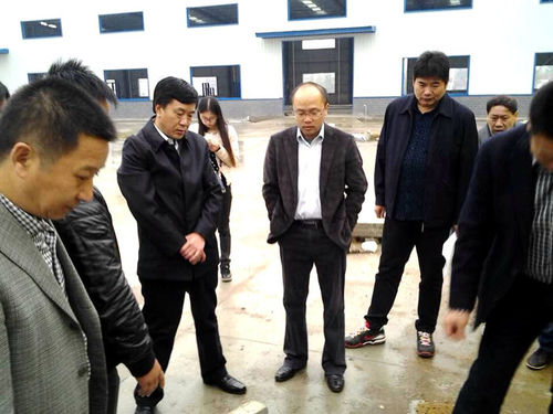 The Secretary of the County Committee Hu Xiaoguo’s Visit to Our Factory for Research